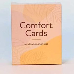 A photo of CuddleBuddy comfort cards standing upright.